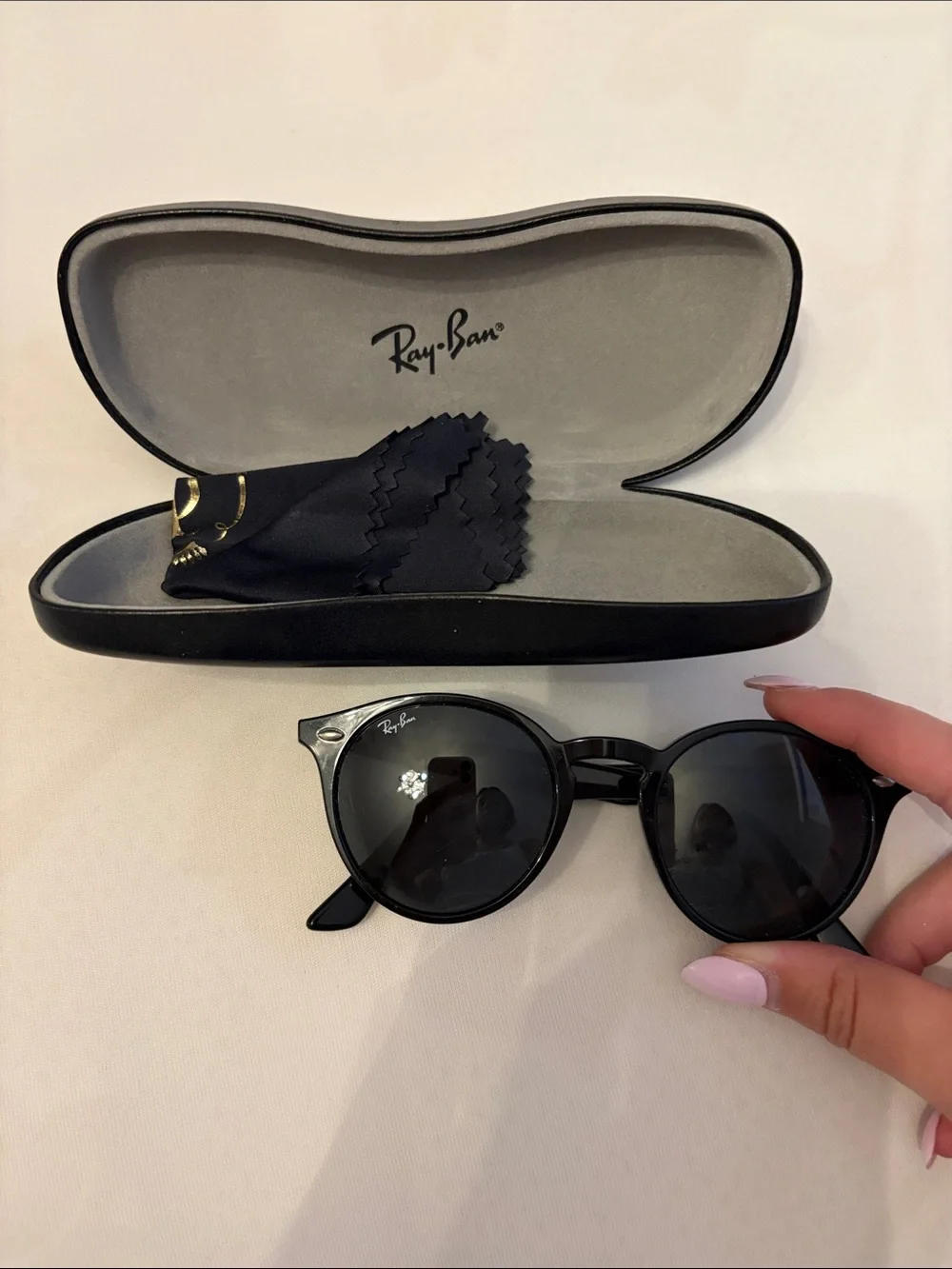 Ray-Ban Black Frame Green Lens Round Sunglasses RB2180